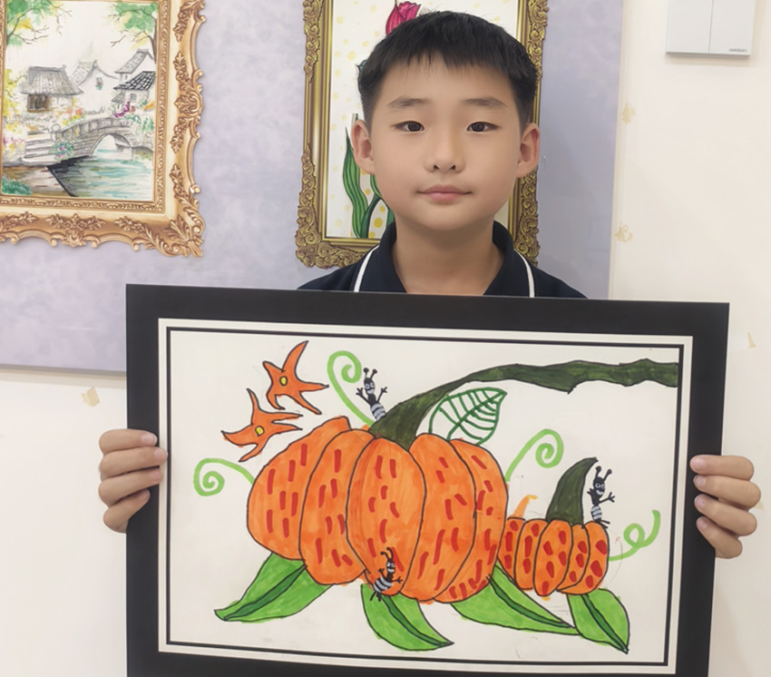 西城街道新景四季東社區(qū)關(guān)工委”秋分繪就南瓜意 少年書(shū)盡季秋情“活動(dòng)照片2_副本.jpg